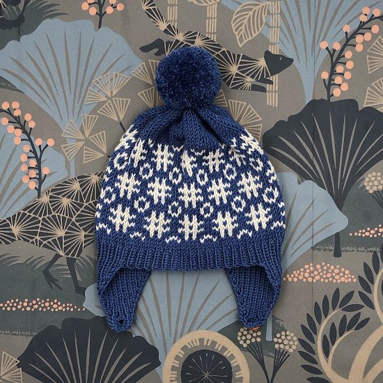 Knit bonnet CLYDE handknitted of virgin merino wool VAN BEREN