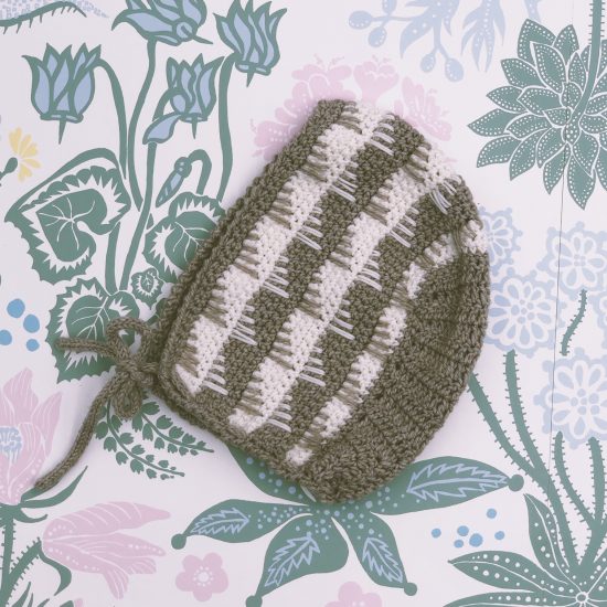 Knit bonnet MOLLY handknitted of virgin merino wool VAN BEREN