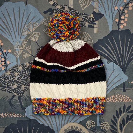 Knit bonnet JULIANA handknitted of virgin merino wool VAN BEREN