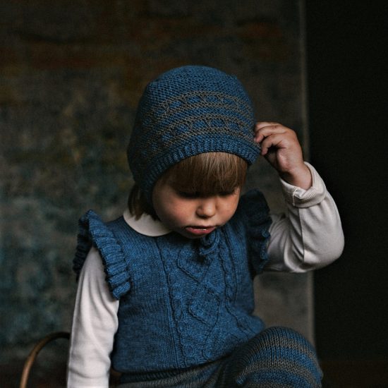 Knit bonnet ESTHER handknitted of virgin merino wool VAN BEREN
