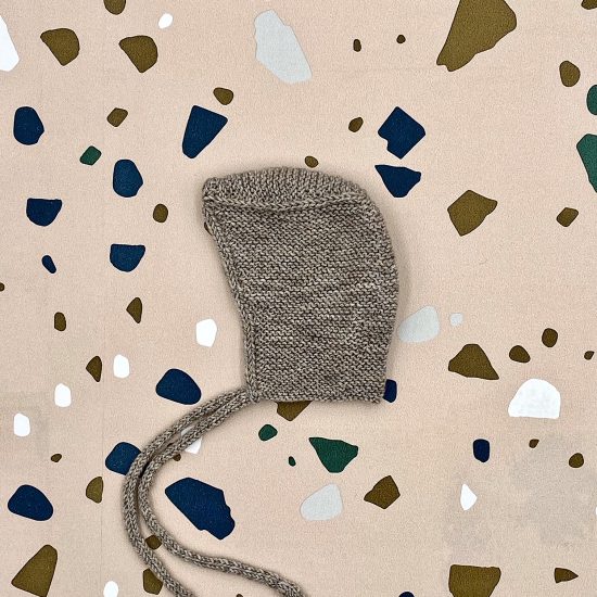 Baby bonnet RUFUS handknitted of merino wool VAN BEREN