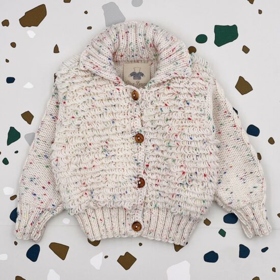 Baby FRINGE cardigan handknitted in Austria of virgin merino wool VAN BEREN